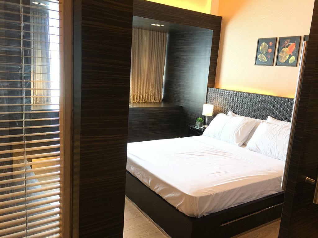 Shang Luxury Suites Мандалуйонг Номер фото