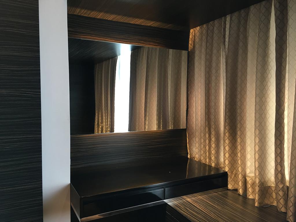 Shang Luxury Suites Мандалуйонг Номер фото