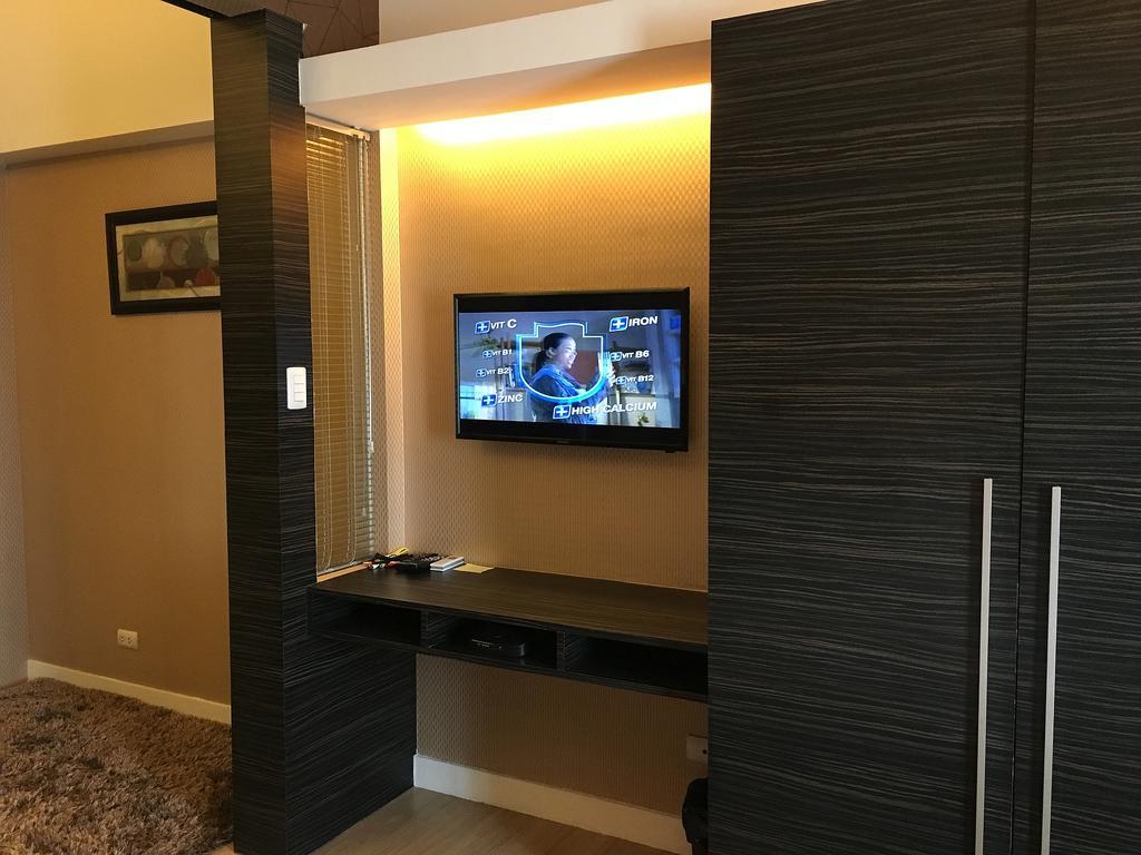 Shang Luxury Suites Мандалуйонг Номер фото