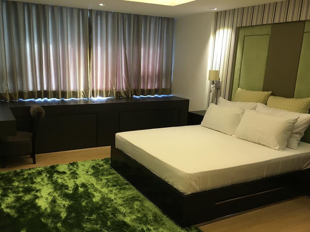 Shang Luxury Suites Мандалуйонг Номер фото