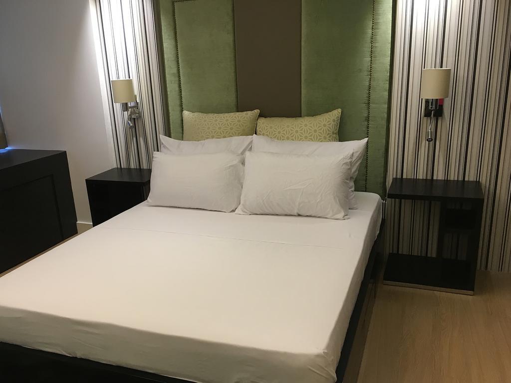Shang Luxury Suites Мандалуйонг Номер фото