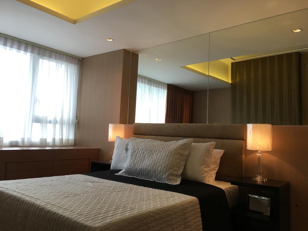 Shang Luxury Suites Мандалуйонг Номер фото