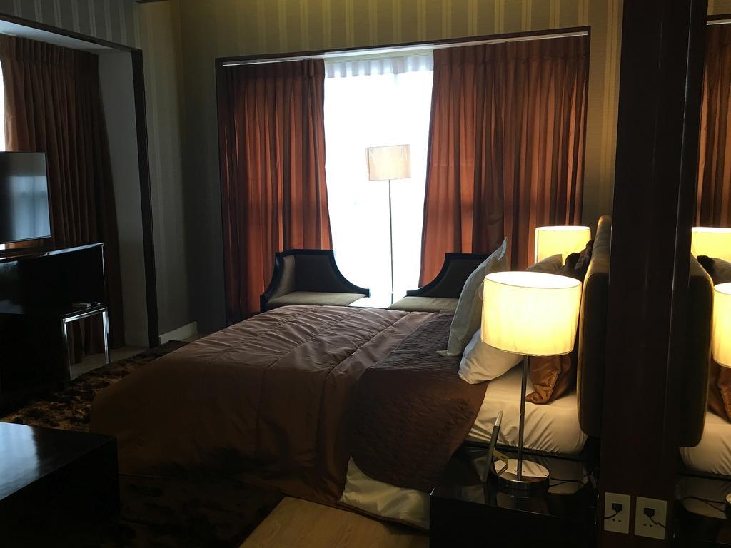 Shang Luxury Suites Мандалуйонг Номер фото